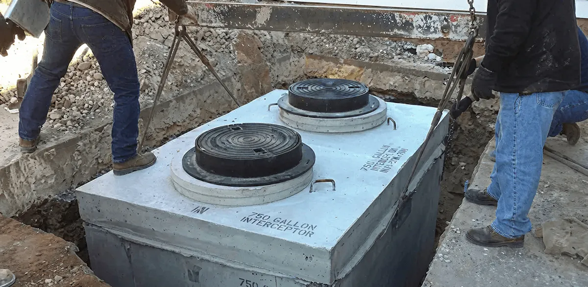 Grease trap installation for a commercial property drainage system in Miami, FL